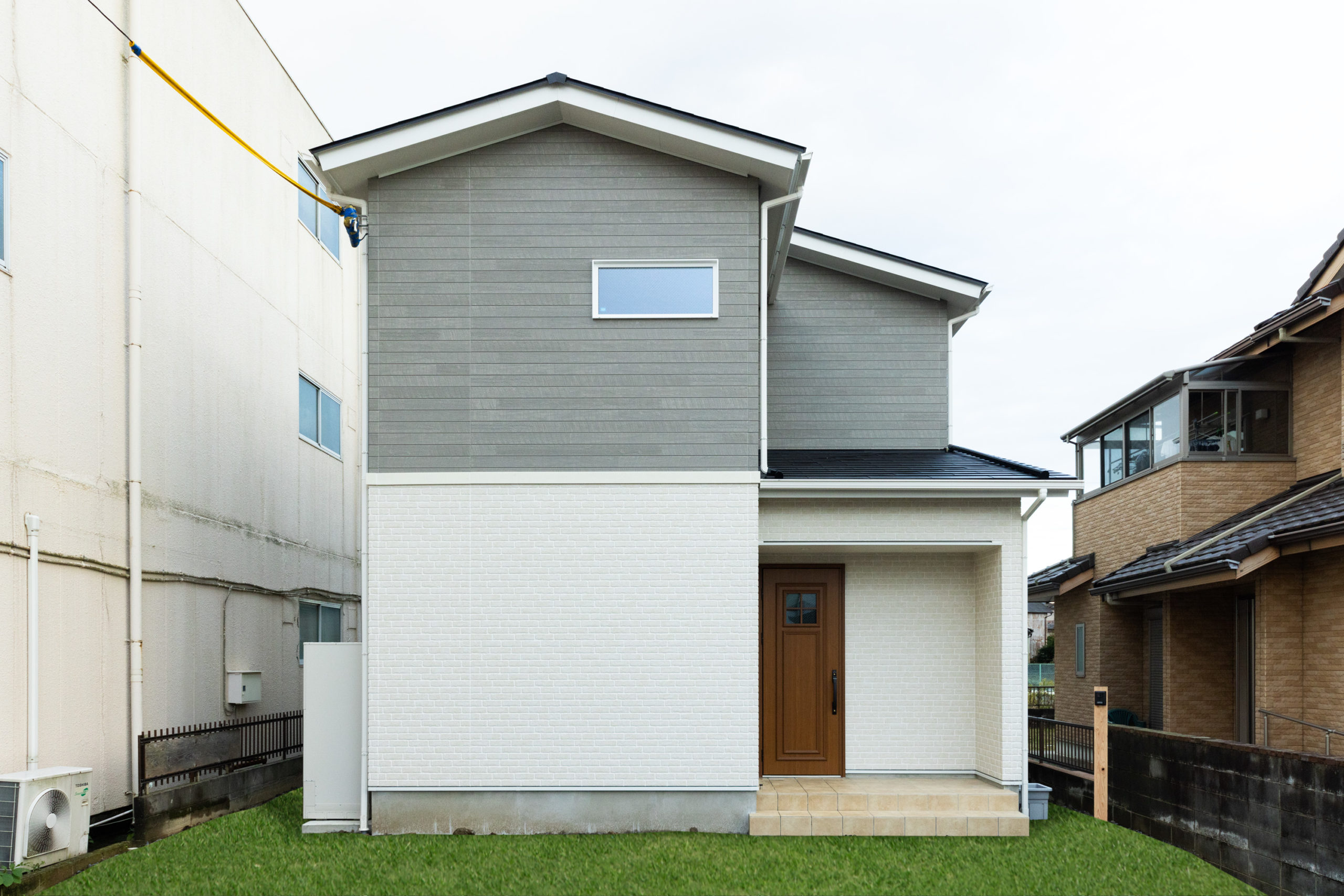 ネイビー・グレー・ブルーのアクセントカラーが爽やかなお住まい